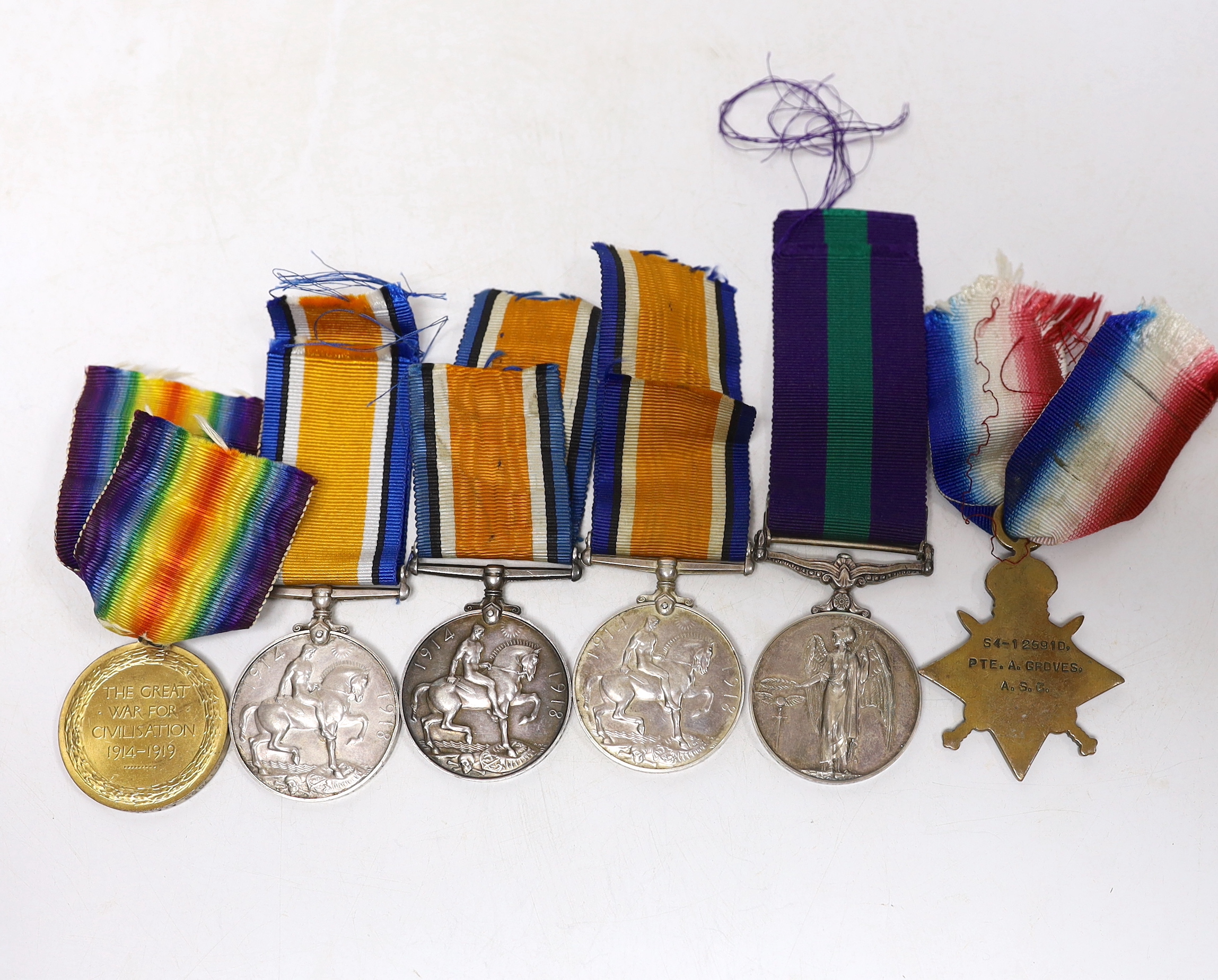 Six medals. Three WWI British War Medals, a Victory Medal, a 1914-15 Star, all named, together with a Capt. G.M. Harrison R.A. P.C., an Elizabeth II Cyprus General Service Medal